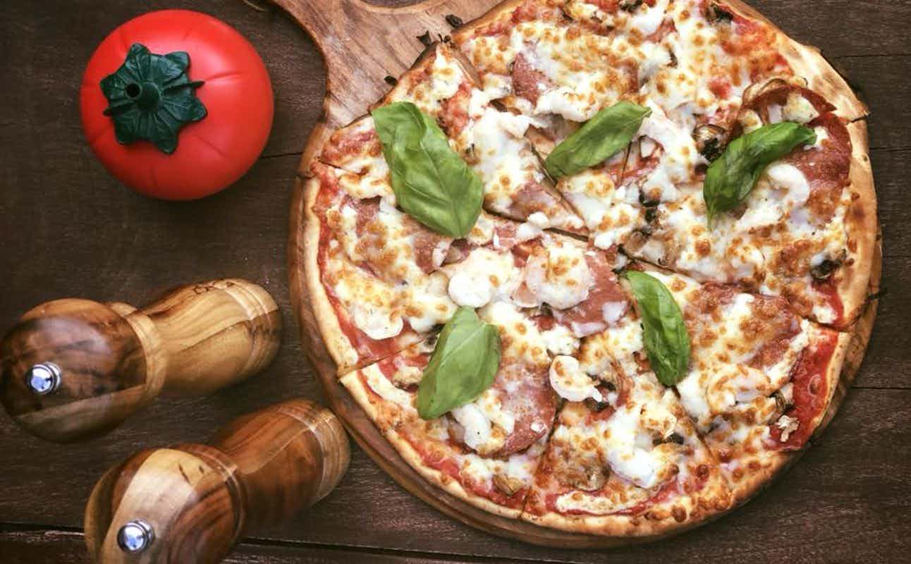 Enjoy Pizza, Vegetarian, Vegetarian options, Vegan Options, Gluten Free Options, Bars & Pubs, Indoor & Outdoor Seating, $$$, Special Occasion and Groups cuisine at The Pizza Library Co. in Mount Maunganui, Bay Of Plenty
