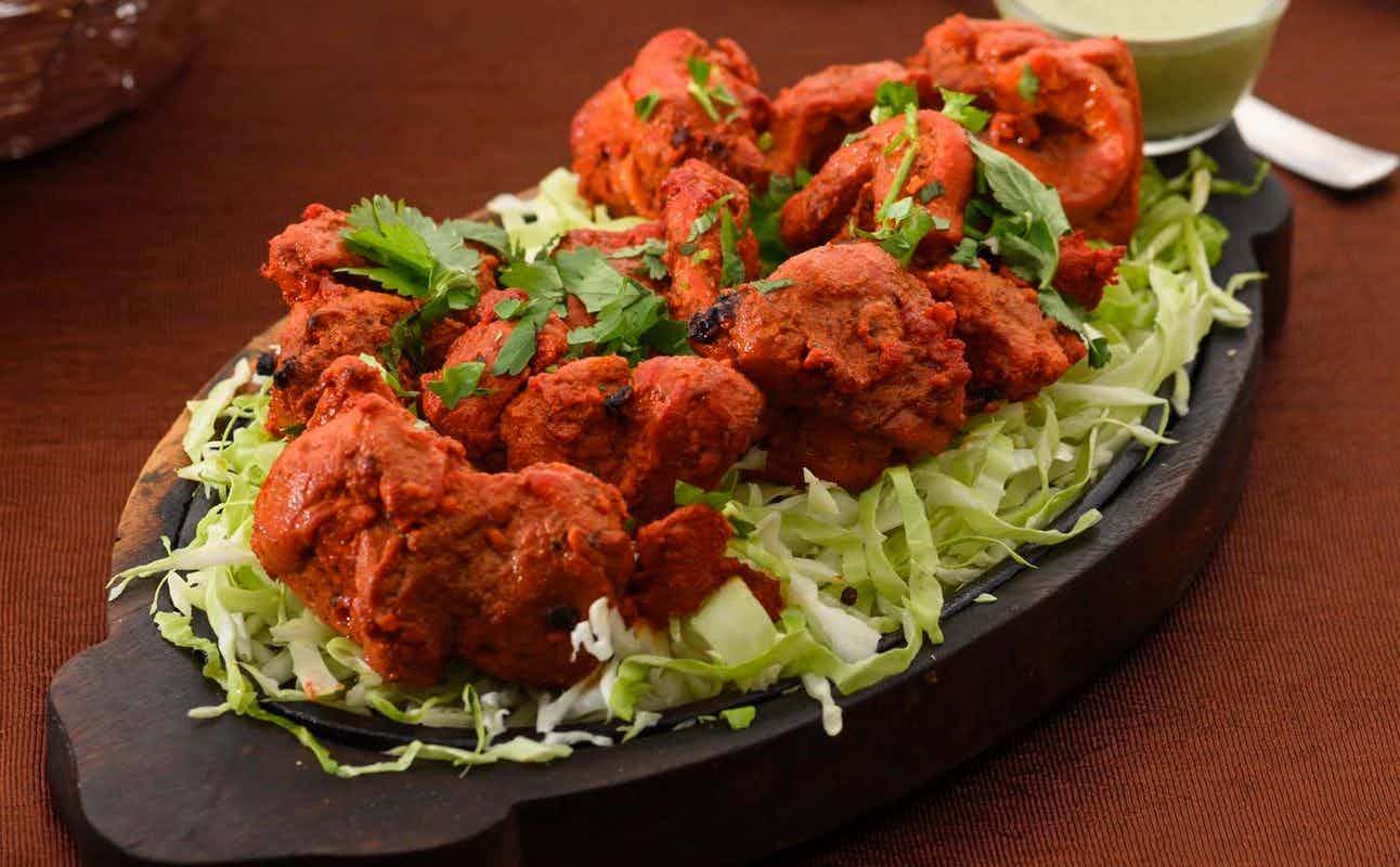 Enjoy Indian, Vegetarian options, Restaurant, Indoor & Outdoor Seating, $$, Families and Groups cuisine at The Indian Kitchen Restaurant in Howick, Auckland