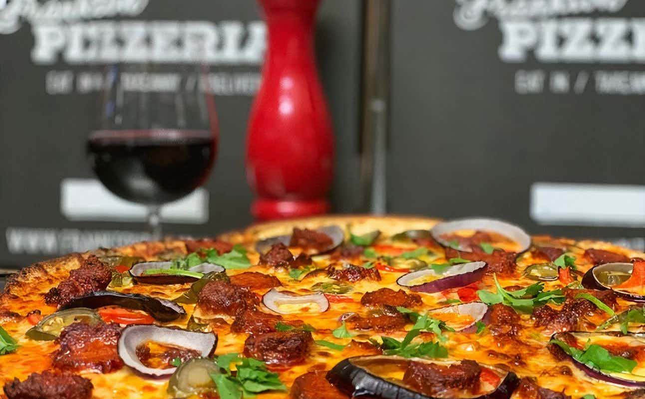 Enjoy Italian, Pizza, Vegan Options, Vegetarian options, Gluten Free Options, Restaurant, Child-Friendly, Table service, Indoor & Outdoor Seating, $$, Families and Groups cuisine at Frankton Pizzeria in Frankton, Queenstown