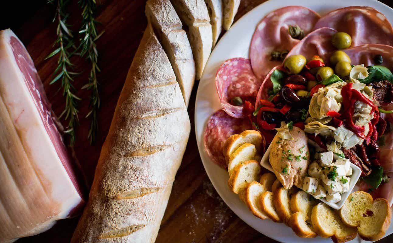 Enjoy Italian and Pizza cuisine at Etrusco At The Savoy in Dunedin Central, Otago