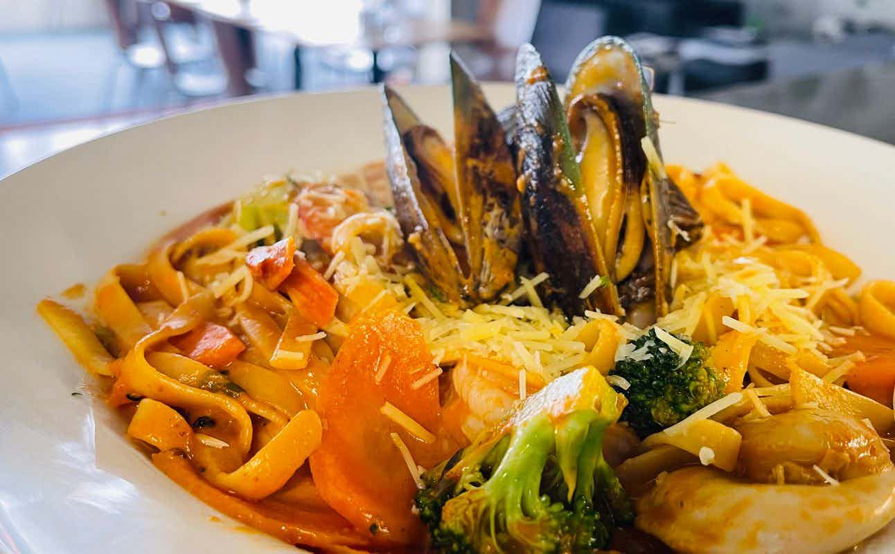 Enjoy New Zealand and Seafood cuisine at La Marina in West Harbour, Auckland