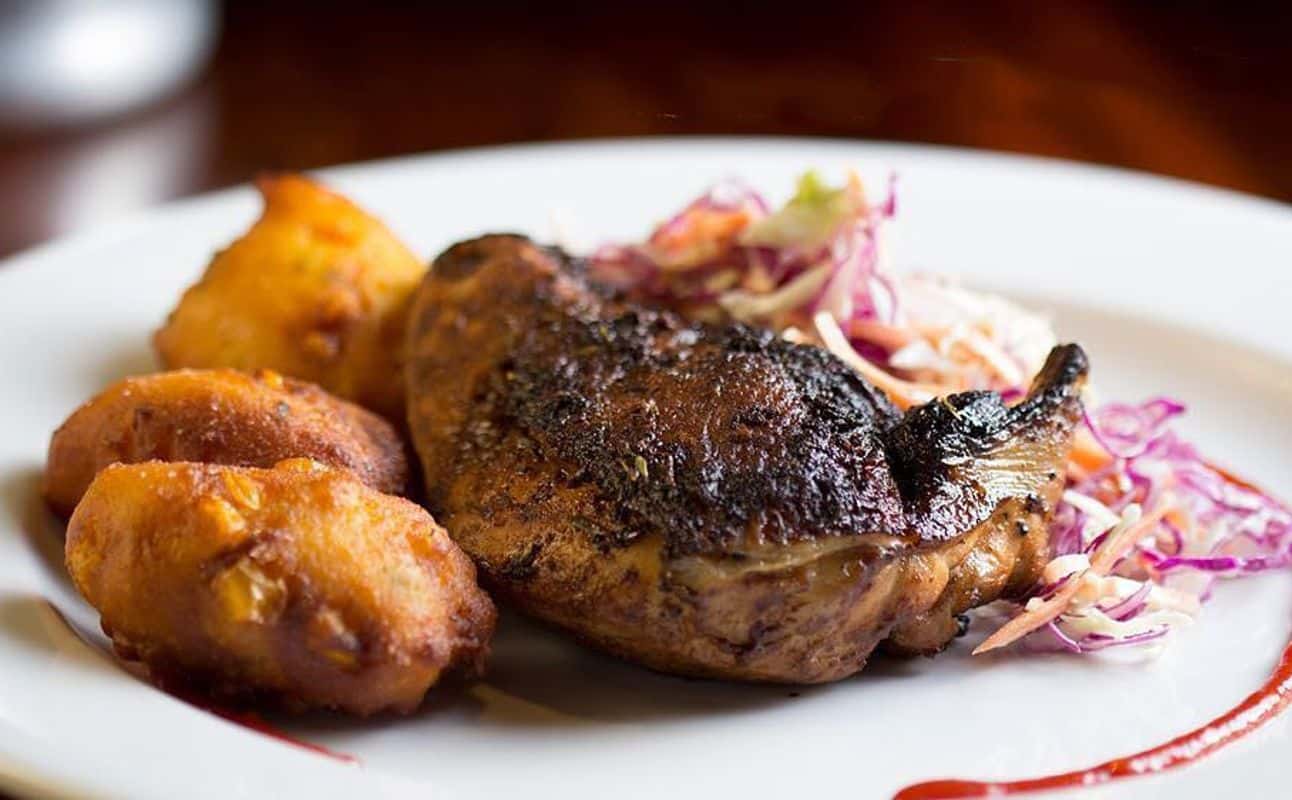 Enjoy BBQ, Cajun / creole and Grill & barbeque cuisine at Bonz Cajun Kitchen in Elliot Stables, Auckland