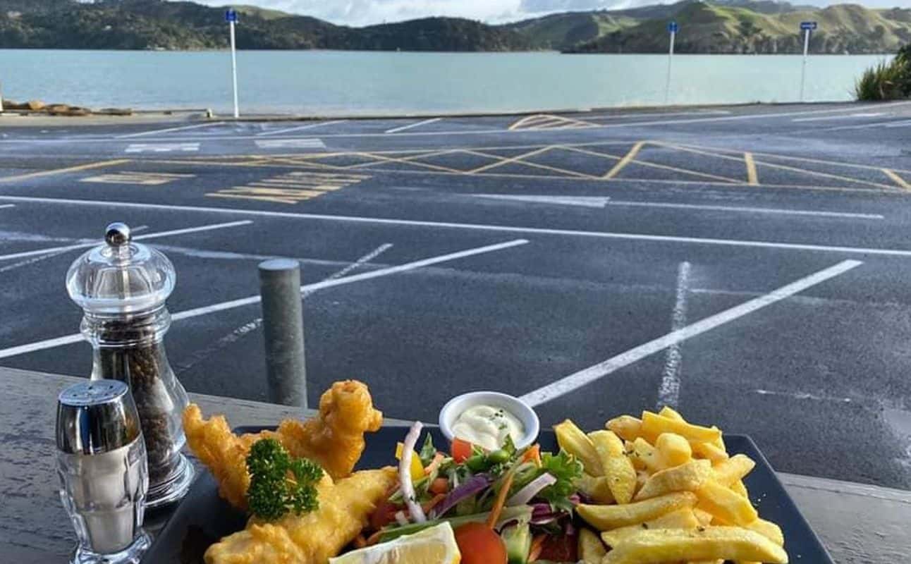 Enjoy New Zealand, Pub Food, Gluten Free options, Vegetarian options, Restaurant, Cocktail bar, Table service, Waterfront, Free wifi, Wheelchair accessible, Street parking, Indoor & outdoor seating, Highchairs available, $$$, Groups, Kids, Families and Views cuisine at The Wharf Kitchen And Bar in Raglan, Waikato
