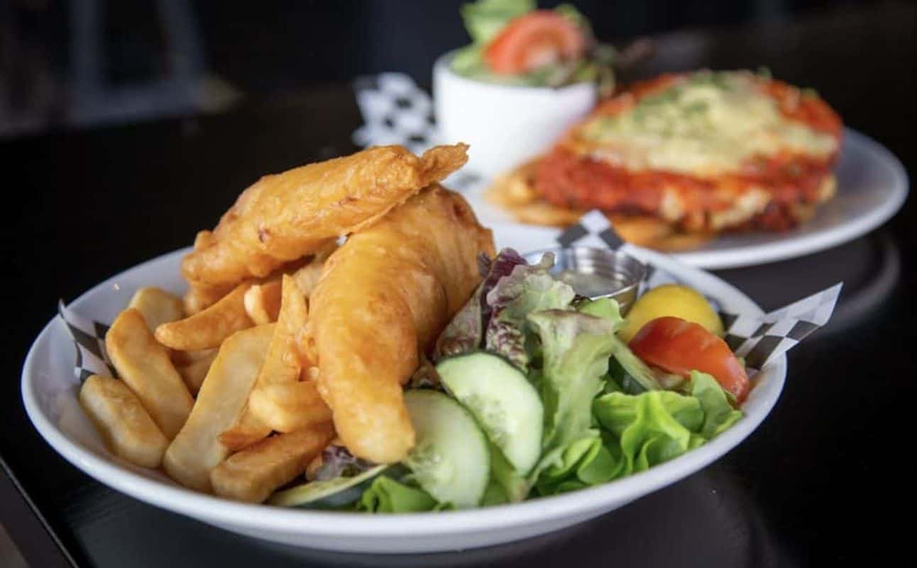 Enjoy British, Vegetarian options, Bars & pubs, Wine bar, Beer garden, Street parking, Indoor & outdoor seating, Wheelchair accessible, Highchairs available, Table service, $$$, Live music, Families and Groups cuisine at The Crown Pub & Beer Garden in Frankton, Queenstown