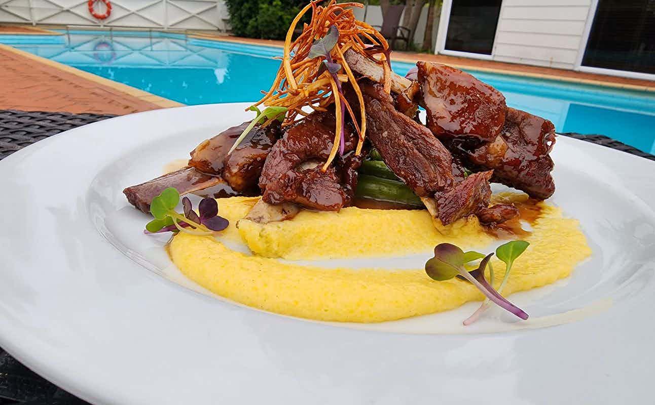 Enjoy New Zealand cuisine at Nikau Restaurant based out of Scenic Hotel Paihia in Paihia, Bay of Islands