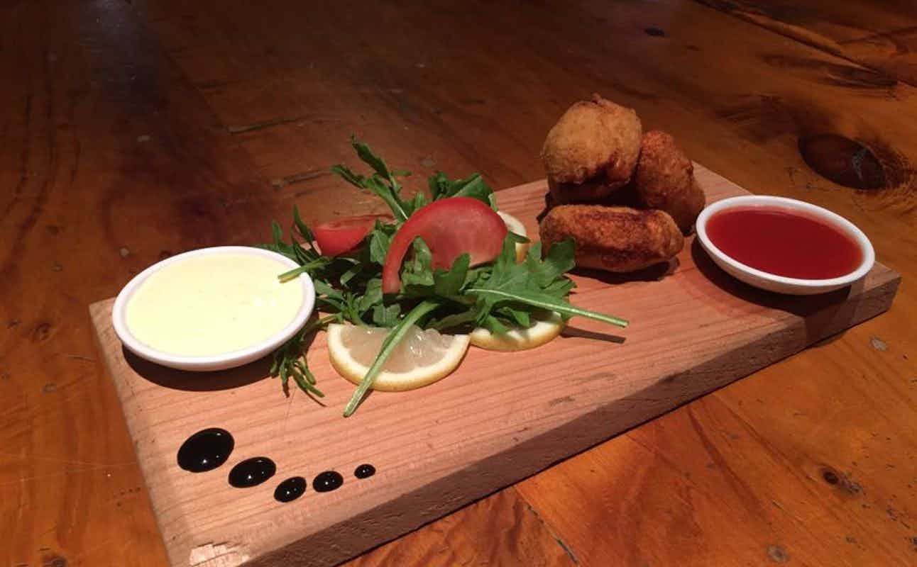 Enjoy Burgers and Pizza cuisine at Hillcrest Haven Bar & Eatery in Hillcrest, Waikato