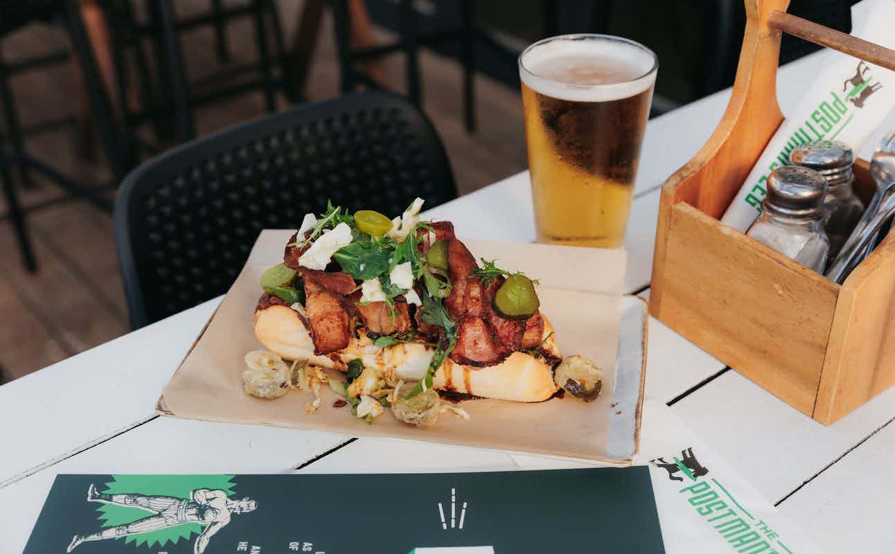 Enjoy Pub Food, Pizza and Burgers cuisine at The Postman’s Leg in Glenfield, Auckland