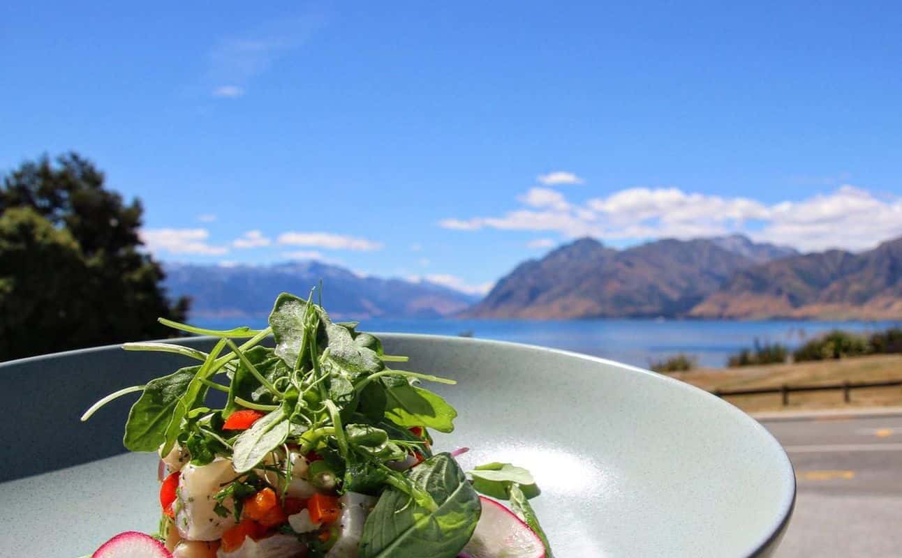 Enjoy New Zealand, Gluten Free options, Vegetarian options, Hotel restaurant, Late night, Indoor & outdoor seating, Wheelchair accessible, Highchairs available, Table service, Waterfront, Free wifi, $$$, Groups, Families and Live music cuisine at Hawea Hotel Lakeside Bistro in Lake Hawea, Wanaka