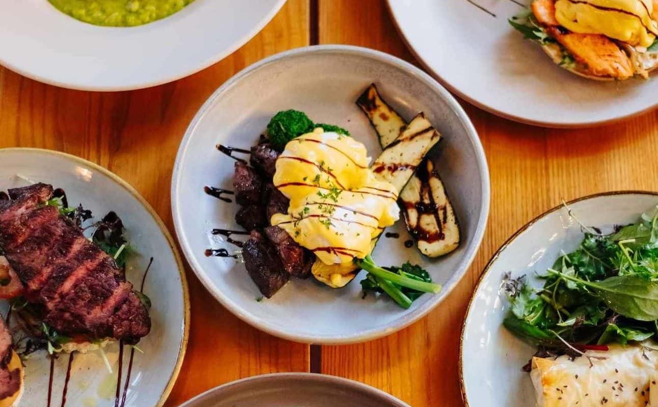Enjoy Pub Food, Dairy free options, Gluten Free options, Vegan options, Vegetarian options, Gastropub, Indoor & outdoor seating, Wheelchair accessible, Free wifi, Street parking, Table service, $$, Views, Groups and Families cuisine at The Whitby Co-op Kitchen and Bar in Porirua, Wellington