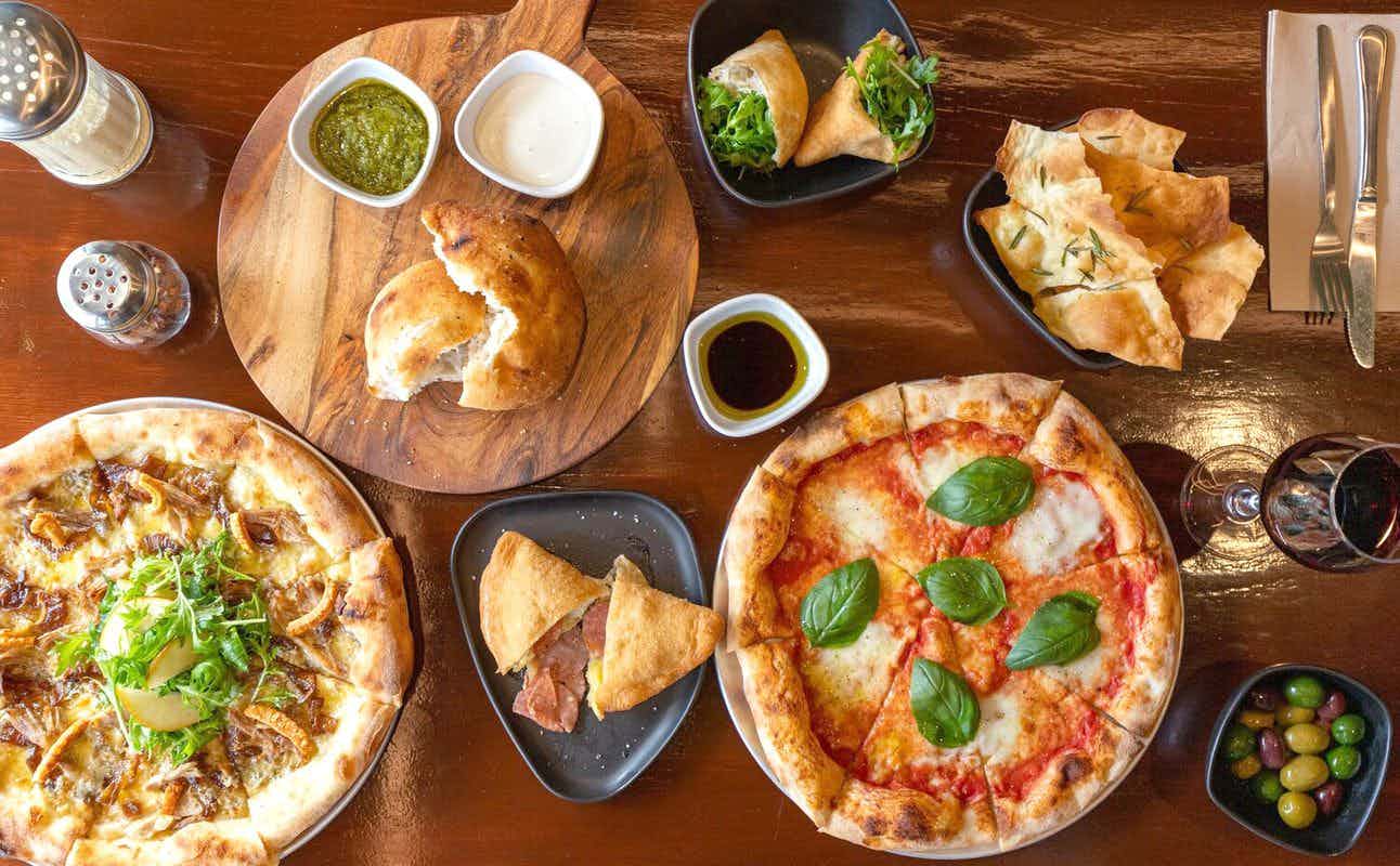 Enjoy Pizza cuisine at Paffuto Pizza in Queenstown