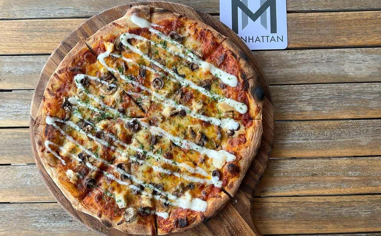 Enjoy American, Pizza, New Zealand, Vegan options, Dairy free options, Gluten Free options, Vegetarian options, Restaurant, Indoor & outdoor seating, $$, Groups and Views cuisine at Manhattan Bar + Eatery in Tauranga, Bay Of Plenty