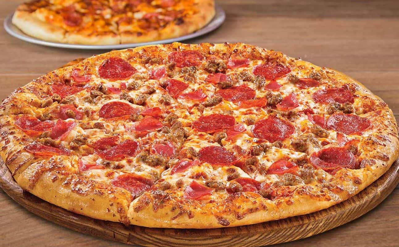 Enjoy Fusion and Pizza cuisine at Mad Hatters in Hamilton Central, Waikato