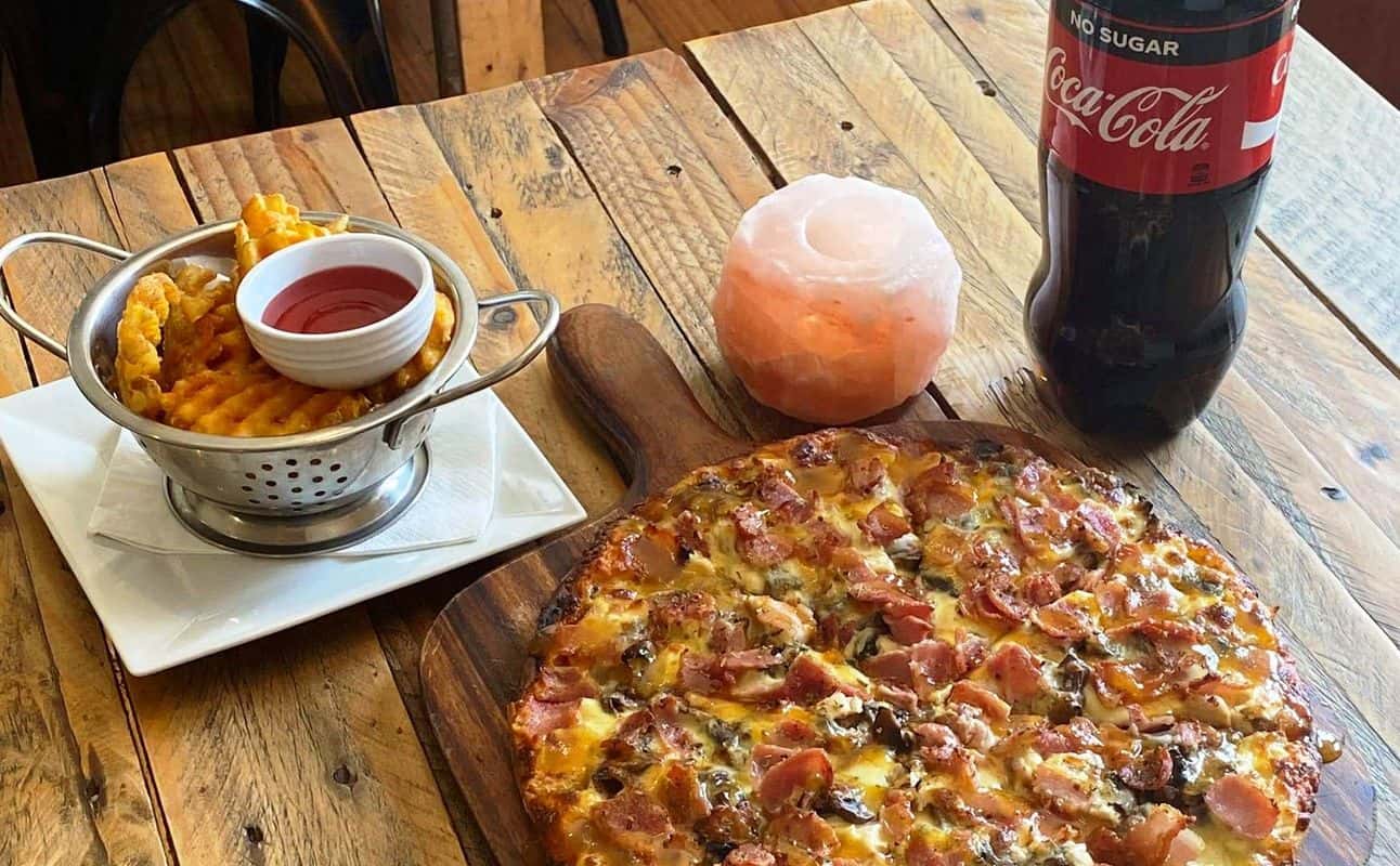 Enjoy New Zealand, Pizza, Burgers, Vegetarian options, Vegan options, Gluten Free options, Restaurant, Indoor & outdoor seating, Wheelchair accessible, Table service, Street parking, Non-smoking, Highchairs available, Free wifi, $$, Groups, Date night, Families, Kids and Special occasion cuisine at Black Rabbit Pizza in Kaikoura, Canterbury Townships