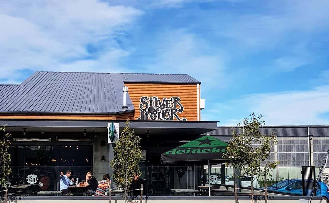 Enjoy American, Steakhouse, Burgers, Vegetarian options, Gluten Free Options, Restaurant, Bars & Pubs, Indoor & Outdoor Seating, Wheelchair accessible, Table service, Highchairs available, Street Parking, $$, Groups, Families and Kids cuisine at Silver Dollar Bar & Restaurant in Rolleston, Christchurch