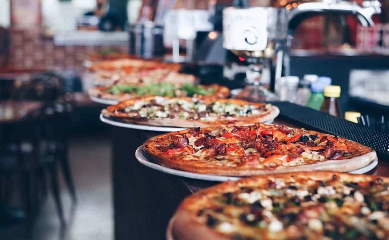Enjoy Pizza, Vegan, Dairy Free Options, Vegetarian options, Vegan Options, Diner, Child-Friendly, Indoor & Outdoor Seating, $$, Families and Groups cuisine at Fat Badgers Pizza Bar in Queenstown CBD, Queenstown